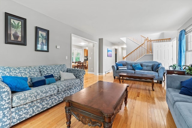 25 Sweetbrier Way, Laconia, NH 03246 - living area with stairway and light wood-style flooring