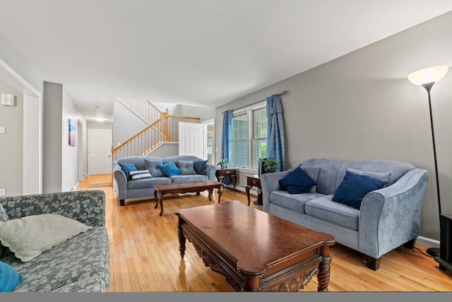 25 Sweetbrier Way, Laconia, NH 03246 - living room with stairs and light wood finished floors