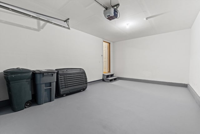 25 Sweetbrier Way, Laconia, NH 03246 - garage with a garage door opener and baseboards