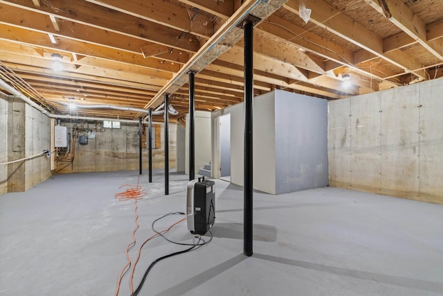 25 Sweetbrier Way, Laconia, NH 03246 - unfinished below grade area with gas meter and tankless water heater