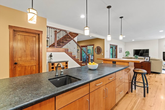 10 Benjamins Way, Hollis, NH 03049 - kitchen with light wood-style floors, recessed lighting, open floor plan, and hanging light fixtures