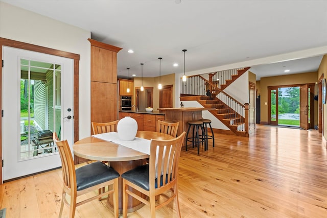 10 Benjamins Way, Hollis, NH 03049 - dining space featuring stairs, light wood-style floors, and recessed lighting