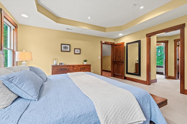 10 Benjamins Way, Hollis, NH 03049 - bedroom featuring light colored carpet, recessed lighting, and a tray ceiling