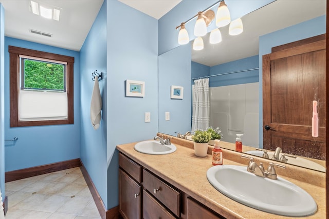 10 Benjamins Way, Hollis, NH 03049 - bathroom with double vanity, tile patterned flooring, and a shower with shower curtain