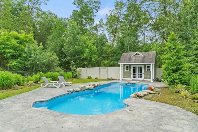 10 Benjamins Way, Hollis, NH 03049 - view of pool with a patio area, an exterior structure, an outbuilding, and a fenced backyard