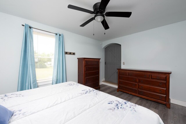 24 Church St, Wakefield, NH 03872 - bedroom with wood finished floors, arched walkways, and ceiling fan