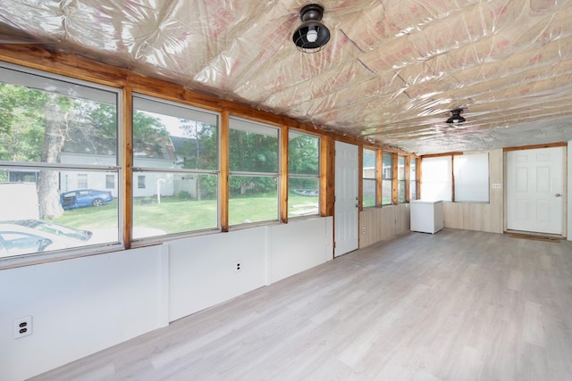 24 Church St, Wakefield, NH 03872 - unfurnished sunroom with healthy amount of natural light and wood finished floors
