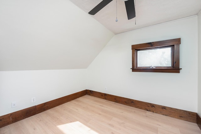 24 Church St, Wakefield, NH 03872 - bonus room featuring ceiling fan, wood finished floors, and lofted ceiling