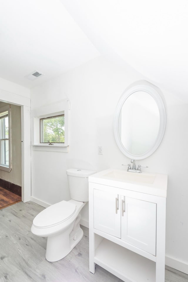 24 Church St, Wakefield, NH 03872 - bathroom with wood finished floors and vanity