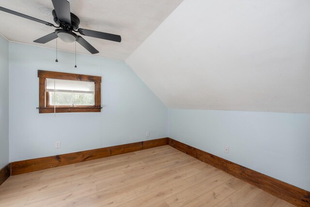 24 Church St, Wakefield, NH 03872 - bonus room featuring wood finished floors, vaulted ceiling, and a ceiling fan