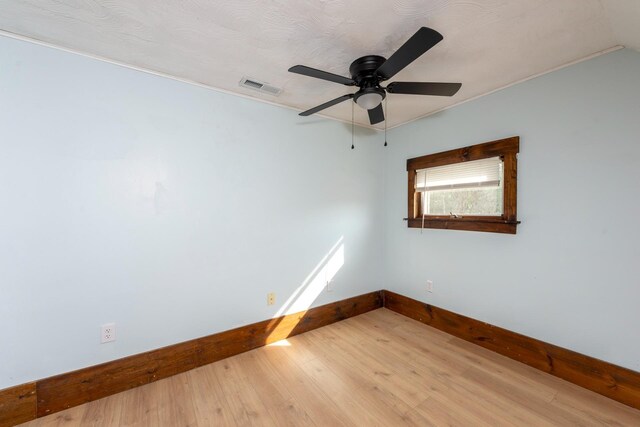 24 Church St, Wakefield, NH 03872 - empty room featuring wood finished floors and ceiling fan