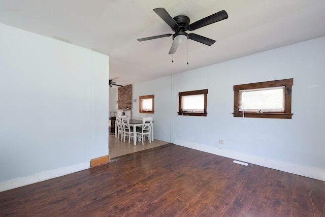 24 Church St, Wakefield, NH 03872 - empty room featuring a ceiling fan and wood finished floors