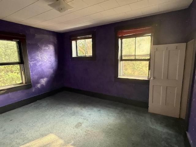 60 S St S, Proctor, VT 05763 - empty room featuring plenty of natural light and carpet