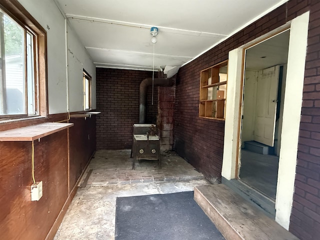 60 S St S, Proctor, VT 05763 - bathroom with brick wall and a wood stove