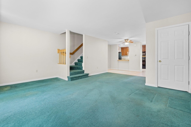 1465 Hooksett Rd Unit 209, Hooksett, NH 03106 - unfurnished living room featuring a ceiling fan, stairway, and carpet flooring
