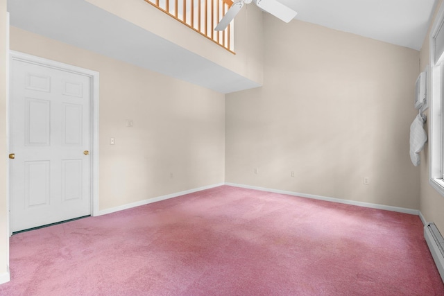 1465 Hooksett Rd Unit 209, Hooksett, NH 03106 - carpeted empty room with ceiling fan, a baseboard heating unit, and high vaulted ceiling