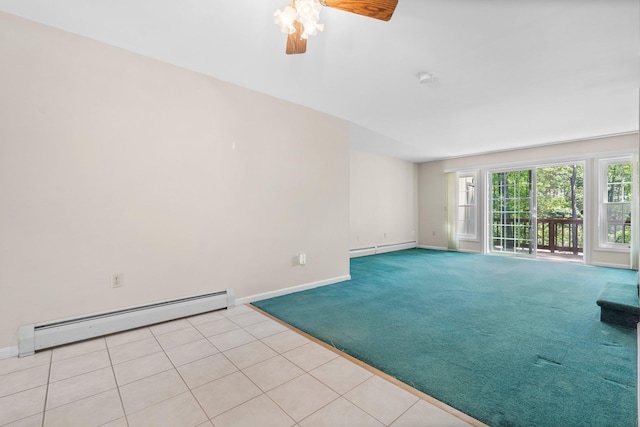 1465 Hooksett Rd Unit 209, Hooksett, NH 03106 - spare room with a baseboard radiator, light colored carpet, light tile patterned floors, and ceiling fan