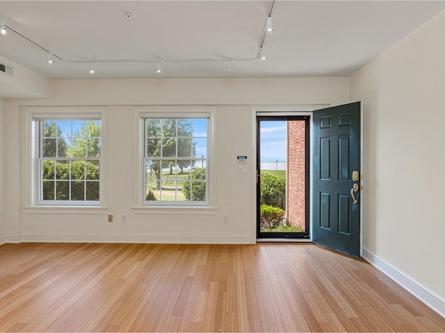 200 Lake St Unit 10, Burlington, VT 05401 - foyer entrance featuring rail lighting and light wood-type flooring