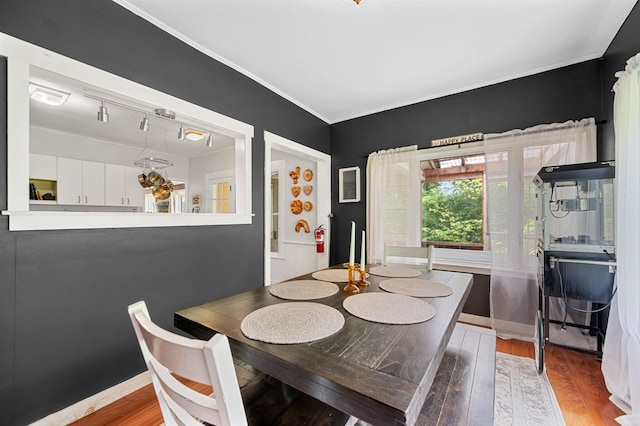 91 Robert Ln, Plainfield, VT 05667 - dining room with wood finished floors and crown molding