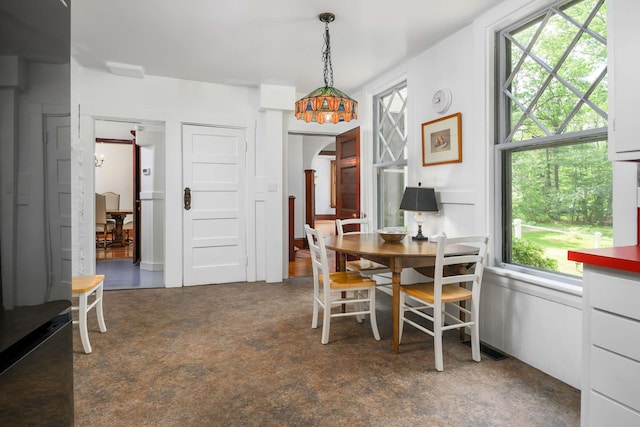 4 Fairbourne Ln, York, ME 03902 - dining room featuring arched walkways and plenty of natural light