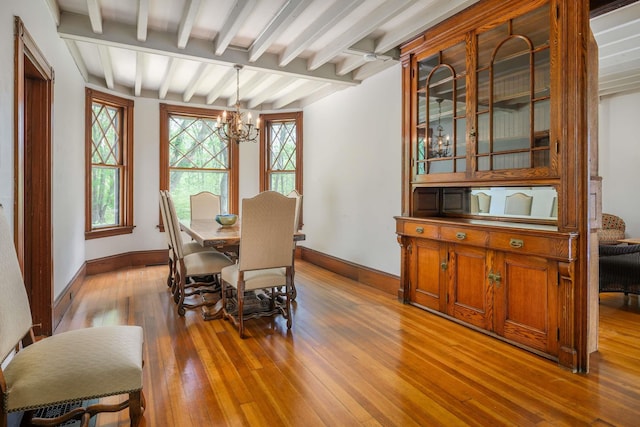 4 Fairbourne Ln, York, ME 03902 - dining area with a chandelier, hardwood / wood-style flooring, and beam ceiling