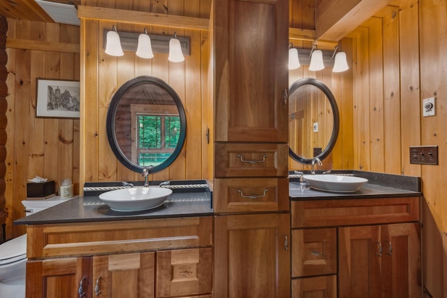7 Reidy Way, Littleton, NH 03561 - bathroom with double vanity and wooden walls