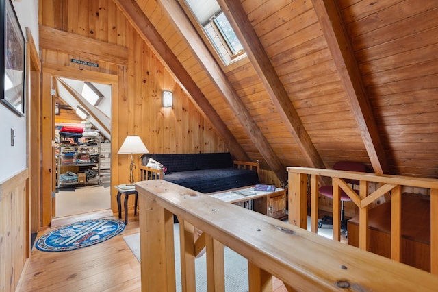 7 Reidy Way, Littleton, NH 03561 - bedroom with wood ceiling, hardwood / wood-style floors, wooden walls, and a skylight