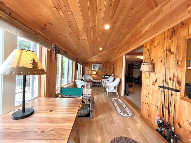 124 Spooner Rd, Pittsburg, NH 03592 - dining area featuring hardwood / wood-style floors, wood walls, lofted ceiling, and wood ceiling