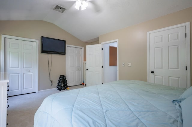 19 Village Falls Way, Merrimack, NH 03054 - carpeted bedroom with lofted ceiling, two closets, and a ceiling fan
