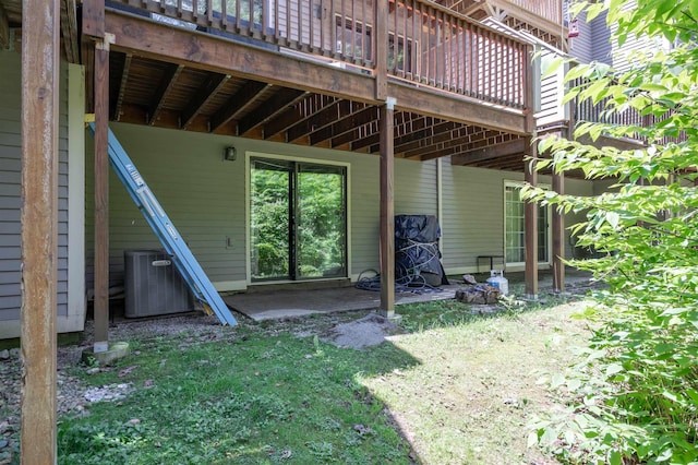 19 Village Falls Way, Merrimack, NH 03054 - rear view of house featuring a deck and a patio area