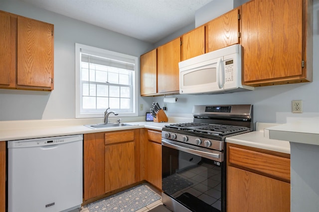 19 Village Falls Way, Merrimack, NH 03054 - kitchen with white appliances and light countertops