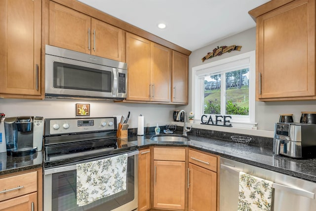 53 Evergreens Dr Unit 3, Laconia, NH 03246 - kitchen with appliances with stainless steel finishes, dark stone counters, and recessed lighting