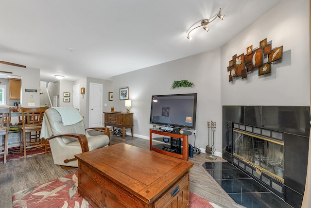 53 Evergreens Dr Unit 3, Laconia, NH 03246 - living room featuring a fireplace with flush hearth and wood finished floors