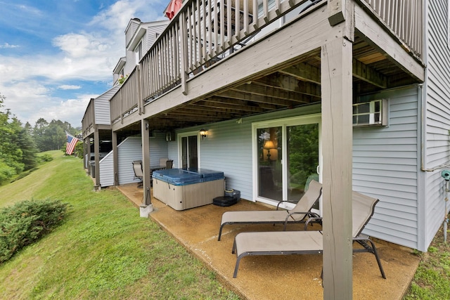 53 Evergreens Dr Unit 3, Laconia, NH 03246 - rear view of property featuring a hot tub, a lawn, a patio area, and a wooden deck