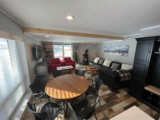 3 River Run Dr Unit A, Bartlett, NH 03812 - dining room featuring a wood stove