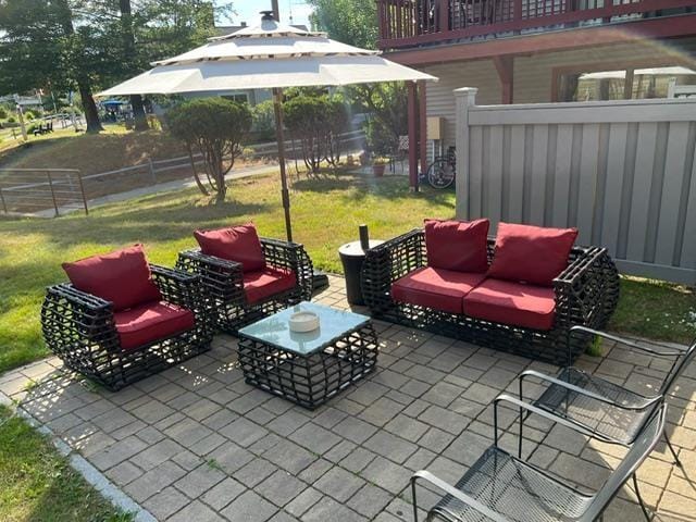 3 River Run Dr Unit A, Bartlett, NH 03812 - fenced backyard with an outdoor hangout area and a patio