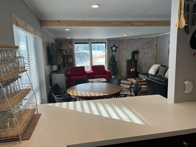 3 River Run Dr Unit A, Bartlett, NH 03812 - living room with a wood stove, healthy amount of natural light, and crown molding