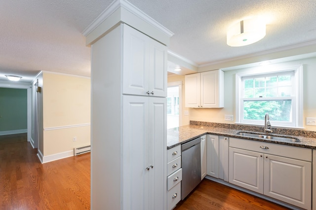 126 Flintlock Vlg Unit 3, Wells, ME 04090 - kitchen with dishwasher, a baseboard radiator, a textured ceiling, dark stone counters, and white cabinets