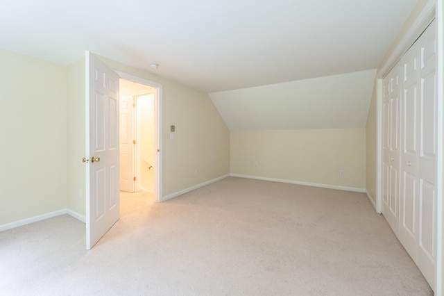 126 Flintlock Vlg Unit 3, Wells, ME 04090 - additional living space featuring light colored carpet and lofted ceiling