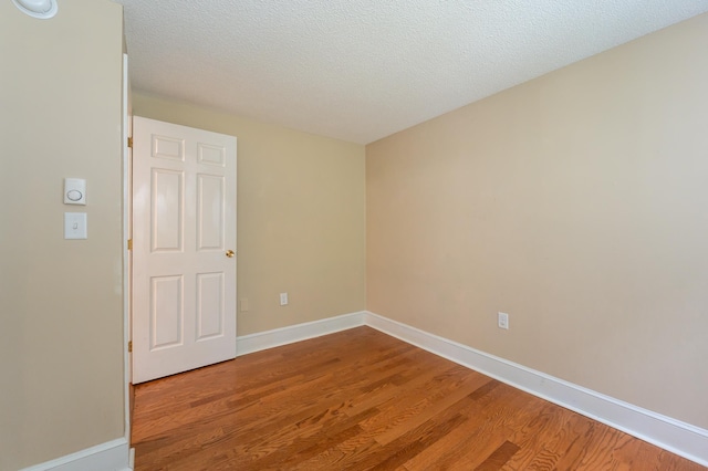 126 Flintlock Vlg Unit 3, Wells, ME 04090 - spare room with light wood finished floors
