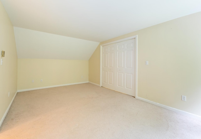 126 Flintlock Vlg Unit 3, Wells, ME 04090 - additional living space with light carpet and lofted ceiling