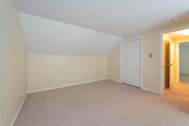 126 Flintlock Vlg Unit 3, Wells, ME 04090 - bonus room with light carpet and vaulted ceiling