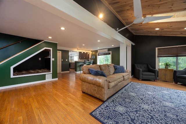12 Water Rd, Goffstown, NH 03045 - living area with light wood finished floors, lofted ceiling, and recessed lighting