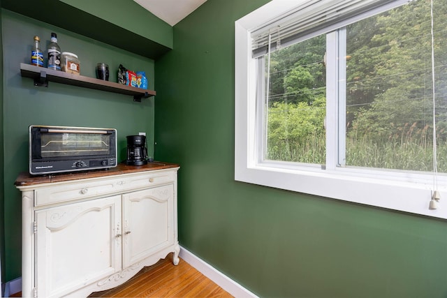 12 Water Rd, Goffstown, NH 03045 - bar area featuring baseboards and wood finished floors