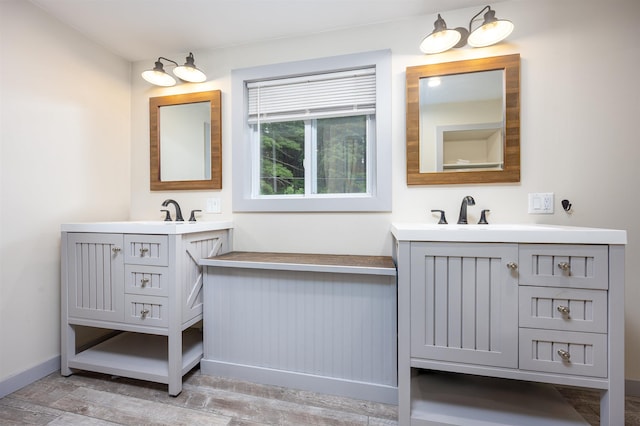 12 Water Rd, Goffstown, NH 03045 - bathroom with two vanities and wood finished floors
