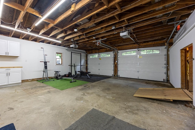 12 Water Rd, Goffstown, NH 03045 - garage with a garage door opener