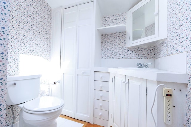 123 S Lincoln St, Keene, NH 03431 - bathroom with toilet and vanity