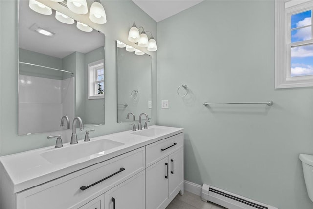 23 Ferris St Unit 102, Saint Albans City, VT 05478 - full bathroom featuring a baseboard heating unit, double vanity, and a shower