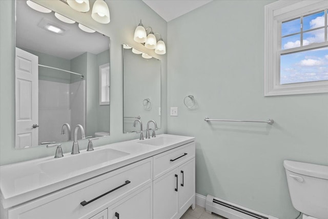 23 Ferris St Unit 102, Saint Albans City, VT 05478 - bathroom featuring a baseboard heating unit, double vanity, a shower, and tile patterned flooring