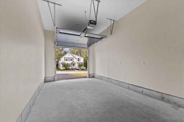 23 Ferris St Unit 102, Saint Albans City, VT 05478 - garage with a garage door opener